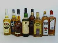 Lote 18 - 8 garrafas de Whisky, garrafa Old Pulteney Single Malt Scotch Whisky, garrafa de Usquaebach Reserva, garrafa de William Peel Finest Scotch Whisky, garrafa Bushmills Irish Whiskey, garrafa de Whyte And Mackay, garrafa de Burberrys Premium, garraf