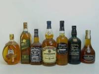 Lote 133 - 7 garrafas, garrafa de whisky Jack Daniels, garrafa de litro de whisky Glen Moray de 16 anos, garrafa de litro de whisky Cutty Sark - Imperial Kingdom, garrafa de whisky W. Grant´s Single Grain, garrafa de whisky Glengoyne 17 anos, garrafa de w