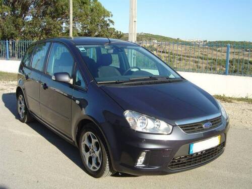 Lote 797 - Ford C-Max 1.6 tdci Titanium, 109cv, de 08/2007, Cinzento Escuro, 104.000 kms. Equipamento: Volante em pele, Direcção assistida, Ar condicionado automático bizonal, Bluetooth integrado, Controlo por voz, Fecho centralizado com controlo remoto