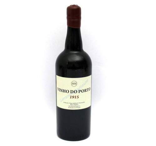 Lote 30 - Garrafa de Vinho do Porto, colheita de 1915, Garrafeira Particular, produzido e engarrafado pelo Vitivinicultor Mário Melhano, São João da Pesqueira. (750 ml).