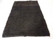 Lote 1185 - Tapete Saggi de algodão e lã, fabricado na Índia, de cor preta, com 140x200 cm