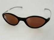 Lote 1470295 - Óculos de sol da marca KIPLING 100% UV com lente de policarbonato, modelo oval, de metal, cor cinza / preto, originais, novos de mostruário