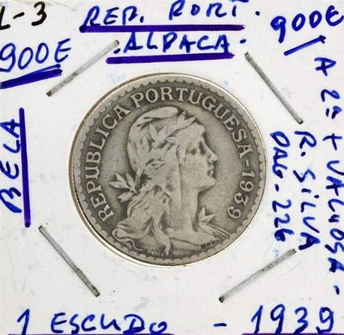 Lote 98 - Moeda de Alpaca de 1 ESCUDO de 1939 que é a 2ª mais valiosa da colecção, em Bela, com um valor de catalogo de cerca de 900 euros ( R. Silva, pag. 226 ).