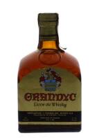 Lote 1834 - 1125 - Garrafa de Licor de Whisky, Grandyc, Destilarias y Crianza Del Whisky, Espanha, (750ml-35%vol). Nota: Garrafa antiga, selo do imposto em pesetas.