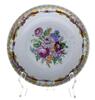 Lote 16 - Conjunto de covilhete fundo e prato em porcelana com decoração floral policromada e dourados. Dim: 19,5 cm (covilhete). Notas: decorações ligeiramente diferentes e marcas diferentes - 2