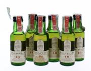 Lote 1865 - Seis garrafas miniatura de Scotch Whisky, Lagavulin, 16 Anos, Single Islay Malt, (50ml-43%vol). Nota: Garrafa idêntica de 200ml, à venda em site da especialidade €25,00 - http://www.bportugal.pt/pt-pt/estatisticas/dominios%20estatisticos/estatisticascambiais/paginas/conversor.aspx#anchor , ligeira perda.