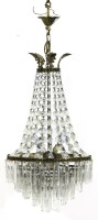 Lote 4025 - Lustre de chuveiro com 5 lumes em metal dourado com decoração relevada e pingentes em vidro. Dim: 90x35 cm. Notas: sinais de uso e algumas falhas