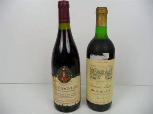 Lote 1600129 - Lote de 2 garrafas de Vinho Tinto Francês, 1 garrafa de Château Luciére - Bordeaux 1992 e 1 garrafa de Bourgogne de 1994, garrafa numerada, Nota: garrafas provenientes de uma garrafeira particular onde estavam armazenadas com todas as condi