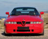 Lote 5159 - Alfa Romeo SZ ou ES30 3.0 V6 210cv 43.414kms de 1991. Vermelho, estofos em couro bege. Veículo idêntico à venda por € 101.650 em http://www.hemmings.com/classifieds/cars-for-sale/alfa-romeo/sz/1762353.html - 5