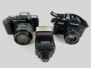Lote 128 - Lote de máquina fotográfica Chinon CP-9 AF Multi Program, com objectiva AF Zoom Lens 28-70 mm 1:3,5-4,5 e flash Chinon AF-S280 TTL, e máquina fotográfica Chinon CG5, com lente Auto Chinon 1:1.9/50 mm