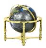 Lote 4021 - Globo terrestre revestido a pedras semipreciosas, madrepérola e esmaltes, com suporte de metal dourado, articulado em esfera armilar e base com bússola, com cerca de 45 cm de altura e 45 cm de diâmetro, pequenos sinais de uso - 2