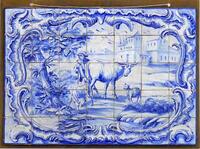 Lote 5038 - Painel de azulejos da fábrica Azularte, assinado, motivo "Pastoreio" em tons de azul, com 70x100 cm e 35 azulejos. Notas: painel aplicado em placa de contraplacado.