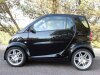 Lote 6145 - Veículo automóvel Smart ForTwo, modelo Brabus 1st Edition, Nº 324/500, Ano 2002, 599 c.c., 71 cv. Combustível gasolina, cor preta, 48.573 Km, deste modelo só existem 500 unidades em todo o mundo, ac, tecto panorâmico, JLL, estofos em pele, pat - 2