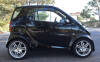 Lote 6145 - Veículo automóvel Smart ForTwo, modelo Brabus 1st Edition, Nº 324/500, Ano 2002, 599 c.c., 71 cv. Combustível gasolina, cor preta, 48.573 Km, deste modelo só existem 500 unidades em todo o mundo, ac, tecto panorâmico, JLL, estofos em pele, pat - 6