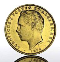 Lote 16 - Moeda de Ouro - 10.000 Reis (Coroa) de D. Luís I de 1886. Peso: 17.74 g. Notas: moeda idêntica à venda por € 850 em http://olx.pt/anuncio/portugal-ludovicus-i-1878-10-000-reis-moeda-de-ouro-IDxYP4l.html