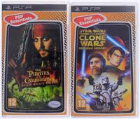 Lote 624 - Conjunto de 2 jogos para PSP composto por: Star Wars - The Clone Wars, Republic Heroes e Pirates of the Caribbean - Dead Man's Chest. Nota: Sinais de uso.