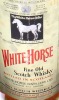 Lote 2200 - Garrafa triple Magnum Fine Old Scotch Whisky, White Horse, 100% Scotch Whiskies, Escócia, (4,5L). Nota: Garrafa idêntica à venda em site da especialidade € 962,71 - https://www.masterofmalt.com/whiskies/white-horse/white-horse-blended-scotch-w - 3