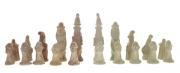 Lote 34 - XADREZ - Conjunto de peças de xadrez composto por 32 peças em pedra sabão de dois tons, de grande detalhe antropomórfico. Peças antigas. Sinais de uso, pequenas falhas e faltas.