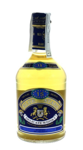 Lote 1189 - WHISKY BLUE STAR - Garrafa de Whisky, 15 Anos, Delicate Whisky, França, (700ml - 40%vol). Nota: Com caixa de metal