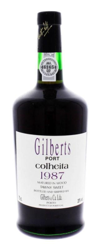 Lote 1858 - PORTO GILBERTS - Garrafa de Vinho do Porto, Gilberts, Colheita 1987, Tawny Sweet, Gilberts & Ca, Porto, (750ml - 20%vol). Nota: garrafa idêntica à venda por € 36. Acondicionada em caixa de madeira. Consultar http://www.leirovins.be/NL/Webshop/