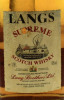 Lote 1866 - WHISKY LANGS - Garrafão de whisky, Langs, Supreme, Lang Brothers, Ltd., Escócia, (1750ml - 40%vol). Nota: com perda adequada ao período de engarrafamento - 3