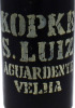 Lote 1993 - AGUARDENTE S.LUIZ KOPKE - Garrafa de Aguardente Velha S. Luiz, Kopke, vinica envelhecida em cascaria de carvalho, engarrafada em 1983, (1000ml – 41%vol). Nota: garrafa idêntica foi vendida por € 105,80. Rótulo com manchas. Consultar http://opo - 3