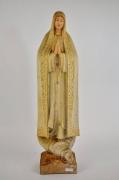 Lote 1870384 - Imagem de Nossa Senhora de Fátima em cerâmica com 51 cm de comprimento, com falhas