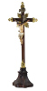 Lote 6119 - CRUCIFIXO COM CRISTO SÉC. XVIII - Trabalho português. Cristo em madeira entalhada e policromada e crucifixo em pau santo com base entalhada e terminais de cruz em talha dourada. Resplendor e legenda em prata. Dim: 36 cm (Cristo) e 116 cm (cruc - 2