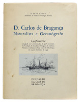 Lote 1572 - LIVRO “D. CARLOS DE BRAGANÇA NATURALISTA E OCEANÓGRAFO” - Por Mário Ruivo. Editado por Fundação da Casa de Bragança. 1958. Com dedicatória. Dim: 26x20 cm. Livro de capa de brochura. Nota: sinais de manuseamento