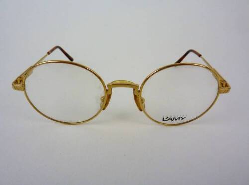 Lote 2000021 - Armação de Óculos, LUNETTE L´AMY, modelo redondo, armação de metal, cor dourado, Originais, Nota: Novos de Mostruário, modelo pequeno