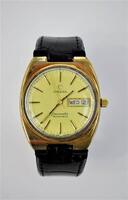 Lote 645 - Relógio *ORIGINAL* da marca OMEGA, modelo Seamaster dos anos 80, movimento automático, mostrador amarelo com indicação de data, bracelete de pele Não original, caixa de aço com plaquet de ouro de 20 microns, com 3,5cm de diametro, Nota: relógio