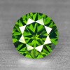 Lote 6074 - DIAMANTE FANCY GREEN 0.61 CT – Natural, talhe brilhante redondo, com o peso 0.61 ct., cor "Intense Green" e pureza VVS2, medidas 5.35 - 5.29 x 3.40 mm, com tratamento de cor. Com certificado da GIL Gemological International Laboratories nº DIA - 4