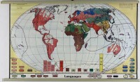 Lote 3 - MAPA "DRAWN AND PRINTED BY KARL WENSCHOW GMIH, MUNCHEN, WESTERN GERMANY, LANGUAGES" - Mapa em papel dos anos 50/60, escala 1:30.000.000. Dim: 74 x 120 cm. Nota: Sinais de uso, com sistema de suspensão e de enrolamento, em inglês.