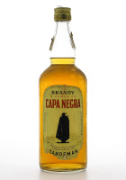 Lote 2996 - BRANDY CAPA NEGRA SANDMAN - Garrafa de Brandy, (1000ml - 40%vol). Nota: garrafa idêntica de 750ml à venda por € 350. Rótulo danificado. Consultar valor indicativo em http://www.lusawines.com/vinhos/445