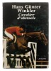 Lote 3135 - LIVRO "CAVALIER D´OBSTACLE" - Edição em língua Francesa. Por Hans Günter Winkler. Fotografias por Horst Lichte. Exemplar idêntico à venda por € 59. Editora: Charles-Lavauzelle, 1980. Dim: 32x23 cm. Encadernação cartonada do editor. Nota: sinai