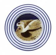 Lote 24 - MAGRITTE, CINZEIRO DE PORCELANA - Marcado na base Magritte The Collection, 1990, By Adagp e Flammarion 4, tiragem 501/1000, motivo “Cachimbo”, com 19 cm de diâmetro. Nota: sinais de uso