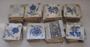 Lote 1827 - Lote composto por cerca de 50 azulejos do Séc. XVIII, com motivos de flores e animais em azul e branco, azulejos com barra de rodapé em manganés e azulejos policromados, NOTA: usados
