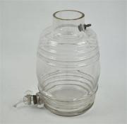 Lote 694 - Frasco de vidro, canelado, com torneira também em vidro, 35 cm de altura, falta tampa ou rolha