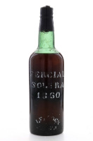 Lote 2003 - SERCIAL SOLERA 1860 - Garrafa de Vinho da Madeira Leacocks, (750ml aprox). Nota: garrafa idêntica à venda por € 1.190. Ligeira perda adequada ao período de engarrafamento. Consultar valor indicativo em http://www.sodivin.us/purchase-of-wine/Th