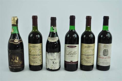 Lote 23 - Lote de 6 garrafas de vinho tinto composto por Real companhia Velha - Dão - 1983, Lello - Douro - 1999, Dão Reserva - 1975 (lacre com falhas), Quinta da Pousa - Douro - 1994 e 2 garrafas de Quinta dos Murças - Douro - 1996