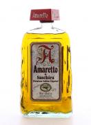 Lote 3140 - LICOR AMARETTO DI SASCHIRA - Garrafa de Licor, Amaretto di Saschira, Premium Italian Liqueur, Luxardo, (750ml-28% vol.). Nota: apresenta ligeira perda. Amaretto di Saschira é um licor refinado clássico, com um sabor aveludado e aroma de amêndoas.