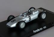 Lote 13 - RBA, PORSCHE 804, FORMULA 1, 1962 - Miniatura à escala 1:43, em plástico e metal cinzento, em caixa acrílica. Carro nº 8, Jo Bonnier. Nota: como novo, embalagem de origem, caixa rachada