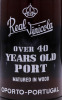 Lote 3021 - PORTO REAL VINÍCOLA 40 ANOS - Garrafa de Vinho do Porto, Over 40 Years Old, Matured in Wood, Real Companhia Vinícola do Norte de Portugal, Vila Nova de Gaia, (750ml - 20%vol.). Nota: garrafa idêntica à venda por € 165. Consultar valor indicati - 3