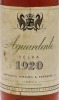 Lote 3039 - AGUARDENTE 1920 - Garrafa de Aguardente Velha, Envelhecida em Cascos de Carvalho, Carvalho Ribeiro & Ferreira, Lisboa, (1000ml aprox.). Nota: garrafa similar à venda por € 99. Rolha de cortiça. Consultar valor indicativo em https://www.garrafe - 3