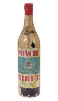 Lote 3171 - PONCHE RIBEL - Garrafa de Ponche, Fábrica Ribel, Lisboa, (1000ml aprox.). Nota: forro de papel dourado da garrafa danificado. Garrafa antiga