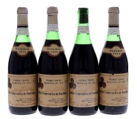 Lote 3348 - ADEGA COOPERATIVA DE PORTIMÃO 1974 - 4 garrafas de Vinho Tinto, Reserva 1974, Adega Cooperativa de Portimão, (750ml - 12,5%vol). Nota: rótulos algo danificados e falta do invólucro de protecção da rolha de uma garrafa