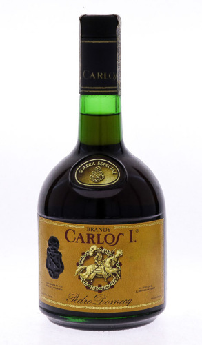 Lote 3991 - BRANDY CARLOS I - Garrafa de Brandy, Solera Especial, Pedro Domecq, Espanha, (750ml - 38%vol.). Nota: garrafa idêntica à venda por € 100. Consultar valor indicativo em https://www.milanuncios.com/bebidas-de-coleccion/brandy-carlos-i-solera-esp