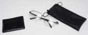Lote 4408 - MONTBLANC - conjunto Montblac composto por um par de óculos com graduação com armação da marca, com bolsa, e um porta-cartões em pele preta com capacidade para seis cartões. Dimensão: óculos 4,5x15,5 cm, porta-cartões 8x10 cm. Sinais de uso
