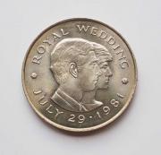 Lote 165 - REINO UNIDO/JERSEY - Moeda de grande formato de 1981 de 2 Pounds Comemorativa do Casamento do Príncipe Carlos e Lady Diana em cupro-níquel, com 28,28 g de peso e 38,5 mm de diâmetro. Estado de conservação SOBERBA, muito limpa e brilhante, com detalhes muito visíveis, com bom valor de catálogo. Estado de conservação ou cotação segundo coleccionador. Sem classificação atribuída pela Oportunity, cabe ao licitante atribuir a classificação e a valorização que entender correta