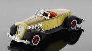 Lote 2 - MATCHBOX, MINIATURA AUBURN 851 SUPERCHARGED SPEEDSTER (1935) - Colecção Carros Clássicos. Escala 1:42, metal bege e castanho-escuro. Made in England. Nota: embalado dentro de caixa de origem. Caixa danificada